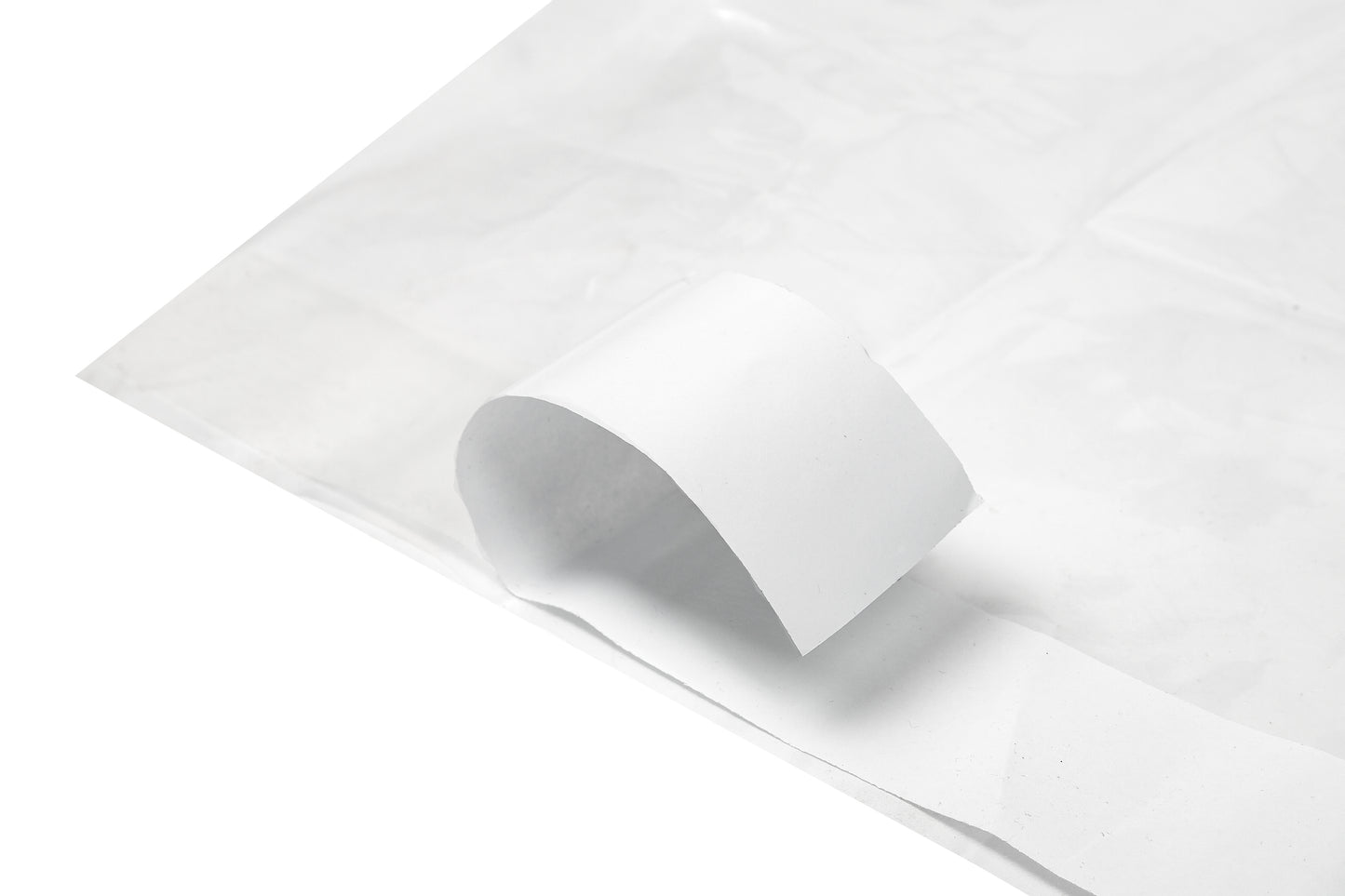 Mattress protector with adhesive tape